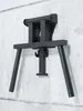 A black dip station mounted on a concrete wall. Produktbild-Vorschau