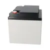A white and black battery with red and white terminals on top. Voir les images du produit