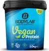 A product shot of a tub of vegan protein powder. Produktbild-Vorschau