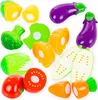 A collection of plastic toy vegetables and fruits arranged on a white background. Náhled obrázku produktu