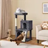 Two cats interacting with a multi-level cat tree in a living room setting. Produktbild-Vorschau