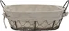 A neutral studio shot of a bread basket. Anteprima dell’immagine prodotto