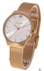 A close-up studio shot of a rose gold women's watch with a white face, displayed on a clear stand. Produktbild-Vorschau