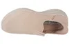 A side view of a beige Skechers slip-on sneaker. Voir les images du produit