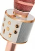 Close-up of a white and rose gold karaoke microphone with buttons. Produktbild-Vorschau