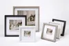 A collection of photo frames of various sizes and colors arranged on a white background. Voir les images du produit