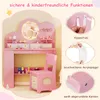 A pink children's vanity desk and chair set with various accessories and safety features highlighted. Náhled obrázku produktu