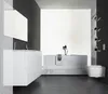 A modern bathroom with a white vanity, bathtub, and toilet. Produktbild-Vorschau