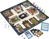 A Cluedo board game laid out on a surface, with game pieces, cards, and dice visible. Podgląd zdjęcia produktu