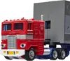 A close-up shot of a red and gray toy truck, specifically Optimus Prime from Transformers. Produktbild-Vorschau