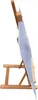 A wooden easel holding a large, thin object, possibly a canvas or board, viewed from the side. Produktbild-Vorschau