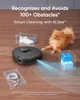 A robot vacuum cleaner is shown on a wooden floor, avoiding obstacles like a shoe, a cable, and building blocks, with a dog nearby. Text highlights the robot's obstacle recognition capabilities. Voir les images du produit