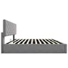 Side view of a gray upholstered bed frame with a diamond-stitched headboard and wooden slats inside the frame. Anteprima dell’immagine prodotto