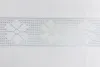 A close-up of white lace trim with a floral pattern on a white background. Produktbild-Vorschau