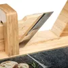 A close-up view of a wooden bread slicer with a metal blade. Náhled obrázku produktu