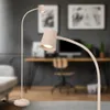 A modern living room or office space with a desk, chair, and sofa, featuring two beige floor lamps. Anteprima dell’immagine prodotto