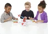 Three children playing a board game. Produktbild-Vorschau