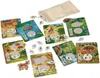 A collection of game boards and tokens for a children's game about feeding animals. Produktbild-Vorschau