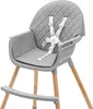 A high-quality studio shot of a gray high chair with wooden legs, isolated on a white background. Náhľad obrázku produktu