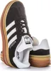 A pair of Adidas Gazelle Bold W sneakers are shown against a white background. Produktbild-Vorschau
