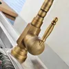 A close-up view of a vintage-style faucet in a sink. Anteprima dell’immagine prodotto