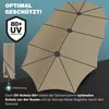 A large taupe umbrella is shown open, with a protective cover and a UV protection badge displayed. Anteprima dell’immagine prodotto