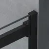 Close-up of a black metal frame and glass panel, likely part of a shower enclosure, against a textured gray wall. Produktbild-Vorschau