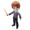 A doll of the character Ron Weasley from Harry Potter, holding a wand. Anteprima dell’immagine prodotto