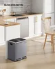 A modern kitchen setting with a dual-compartment trash can in the foreground. Produktbild-Vorschau