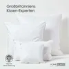Several white pillows of different sizes are arranged in a layered composition against a white background. Produktbild-Vorschau