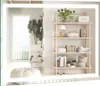 A well-lit room with a modern bathroom mirror and shelving unit. Náhled obrázku produktu