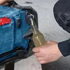 A person is using a Bosch tool to open a bottle of drink. Produktbild-Vorschau