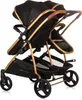 A black and gold double stroller is shown against a white background. Produktbild-Vorschau