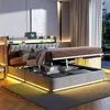 A modern bedroom with a lifted bed revealing storage space and LED lighting. Podgląd zdjęcia produktu
