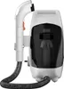 A side view of a white and black fabric stain remover machine with a hose attached. Podgląd zdjęcia produktu