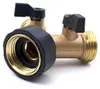 A close-up studio shot of a brass garden hose splitter with black handles on a white background. Produktbild-Vorschau