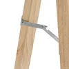 A close-up view of the metal hinge mechanism connecting two wooden legs of a stand. Produktbild-Vorschau