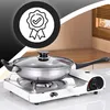 A stainless steel pot with a glass lid sits on a portable gas stove. Voir les images du produit
