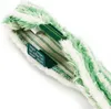 A close-up view of a cleaning tool with green and white stripes. Náhľad obrázku produktu