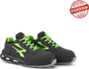 A pair of black and green safety shoes are displayed against a white background. Voir les images du produit