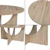 A collage of four close-up images of a round coffee table with a wood-grain finish and a unique base. Produktbild-Vorschau