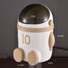 A product shot of a trash can designed to look like an astronaut. Produktbild-Vorschau