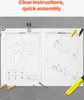 An open instruction manual for a desk bookshelf, with assembly steps and parts list shown. Tools and parts are scattered around the manual. Produktbild-Vorschau