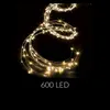 A string of LED lights coiled against a black background. Podgląd zdjęcia produktu