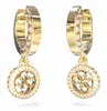 A pair of gold-colored hoop earrings with dangling circular pendants, each adorned with clear stones and a stylized '4G' logo. Anteprima dell’immagine prodotto