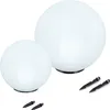 Two white spherical solar lights and four black ground stakes on a white background. Produktbild-Vorschau