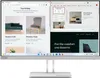 A computer screen displaying multiple web pages and applications, including a furniture e-commerce site and a presentation software. Voir les images du produit