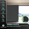 A dark grey retractable awning is shown in front of a large window with a view of mountains and greenery. The left side of the image features a black panel with teal icons and text describing the awning's features, along with the brand logo. Náhľad obrázku produktu