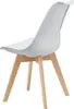 A white chair with wooden legs on a white background. Podgląd zdjęcia produktu
