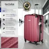 A red suitcase in an airport terminal. Náhled obrázku produktu